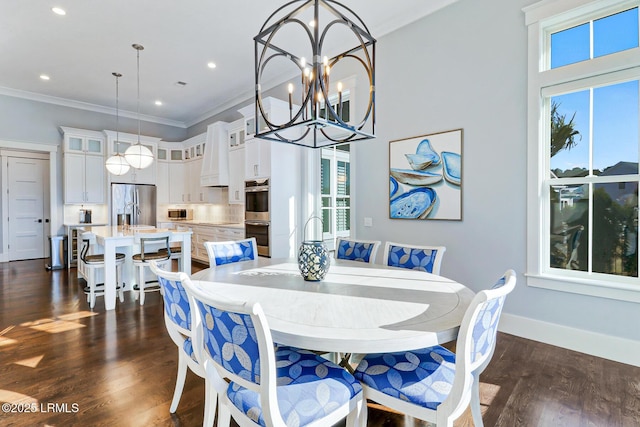 dining room with dark wood-type flooring, baseboards, crown molding, a wealth of natural light, and an inviting chandelier