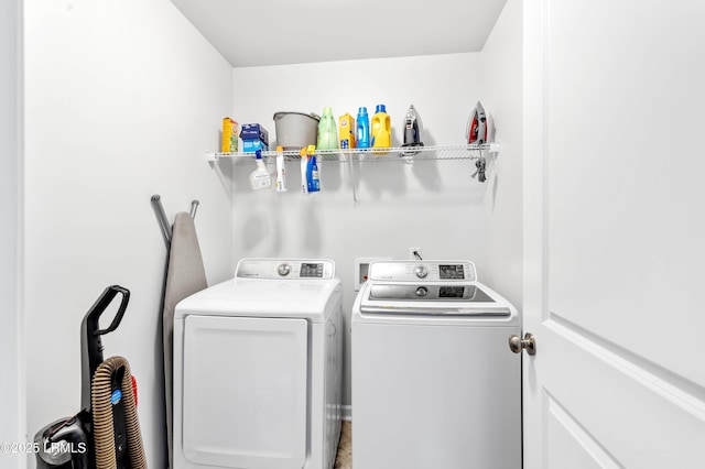 laundry area featuring laundry area and separate washer and dryer