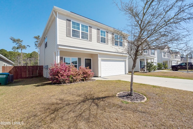 view of front of home with concrete driveway, fence, a front lawn, and an attached garage