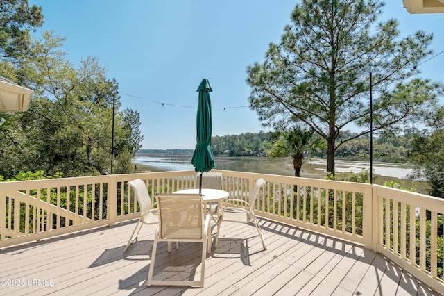 2 S Oak Forest Dr, Okatie, SC 29909 - wooden deck with a water view and outdoor dining space