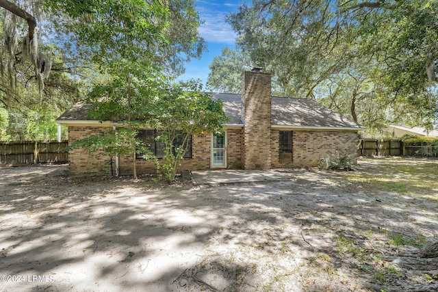 rear view of property with a patio