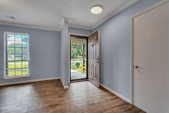 entrance foyer featuring ornamental molding