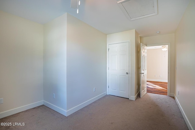 interior space with ceiling fan