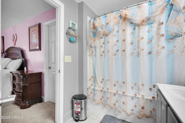 bathroom featuring vanity and shower / bath combo