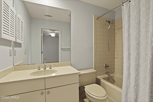 full bathroom featuring shower / bath combo, ceiling fan, toilet, and vanity