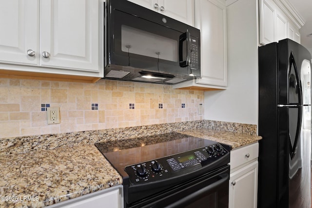 kitchen featuring black appliances, white cabinetry, tasteful backsplash, and light stone counters