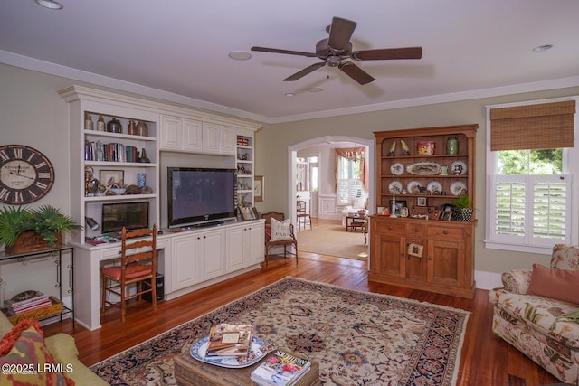 58 Wrights Point Cir, Beaufort, SC 29902 - living area with arched walkways, ceiling fan, plenty of natural light, wood finished floors, and ornamental molding