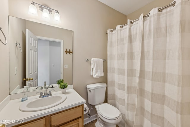 full bath featuring toilet and vanity