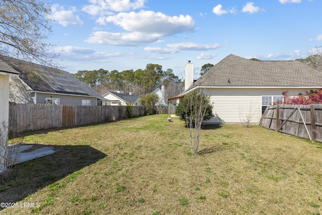 view of yard featuring a fenced backyard