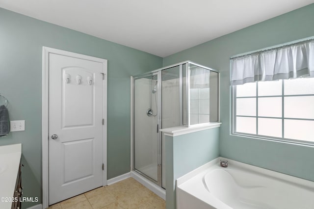 109 Patriot Ct, Beaufort, SC 29906 - bathroom with a stall shower, a garden tub, and vanity