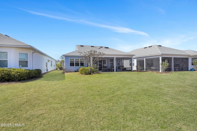 267 Cool Breeze Dr, Hardeeville, SC 29927 - rear view of house featuring a sunroom and a yard
