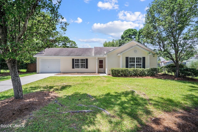 ranch-style house featuring concrete driveway, fence, a garage, and a front lawn