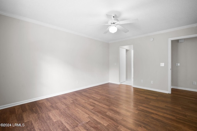 spare room with ornamental molding, baseboards, a ceiling fan, and wood finished floors