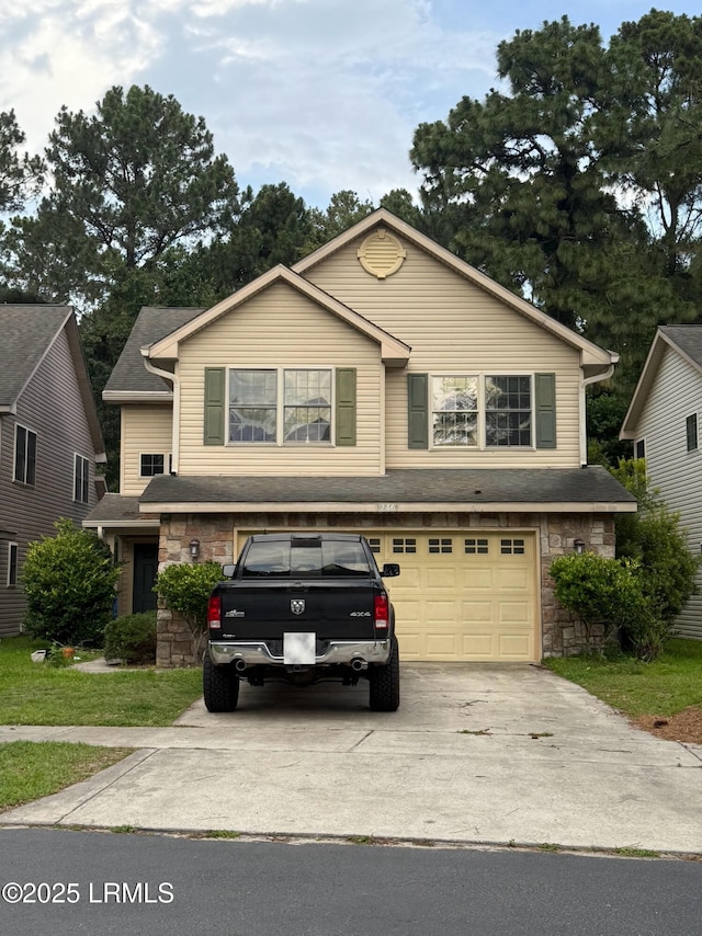 246 Ceasar Pl, Hilton Head Island, SC 29926 - view of front facade featuring stone siding, driveway, and a garage