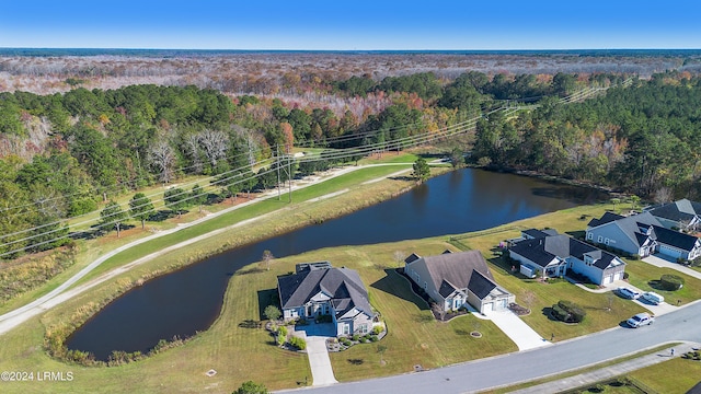 drone / aerial view with a water view