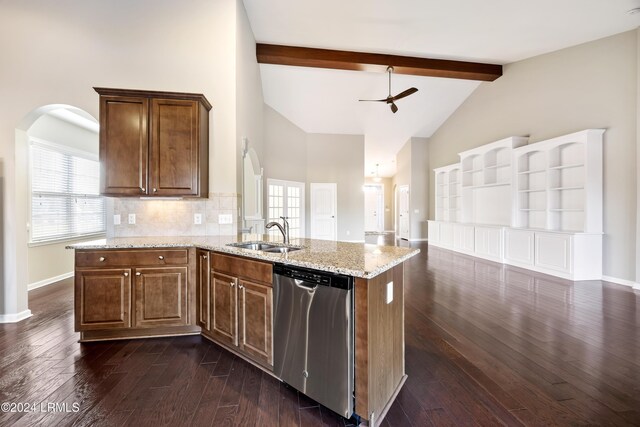 kitchen featuring dark hardwood / wood-style floors, tasteful backsplash, dishwasher, sink, and vaulted ceiling with beams