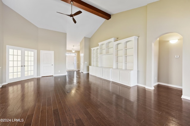 unfurnished living room with dark hardwood / wood-style flooring, high vaulted ceiling, and beam ceiling