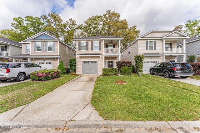 view of front of home with a garage, a balcony, driveway, and a front yard