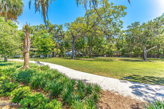 view of home's community featuring a yard