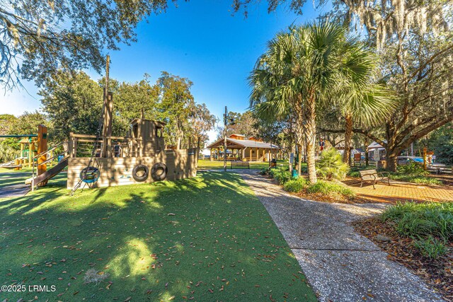 view of yard featuring playground community