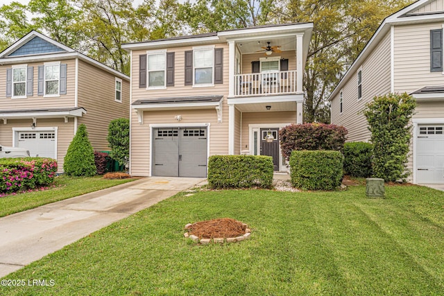 view of front of property featuring concrete driveway, an attached garage, a balcony, and a front yard