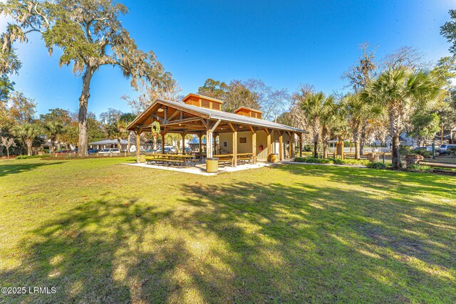 surrounding community with a yard and a gazebo