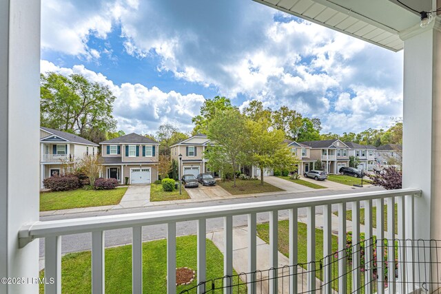 balcony featuring a residential view