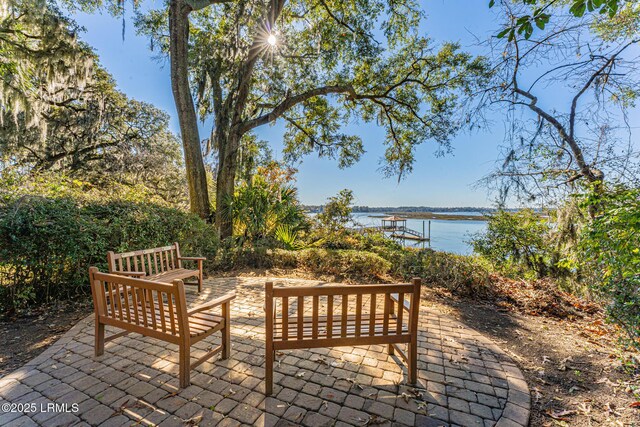 view of patio / terrace with a water view
