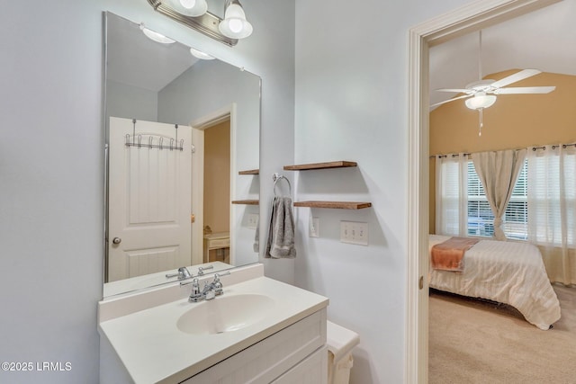 bathroom featuring vanity and ceiling fan