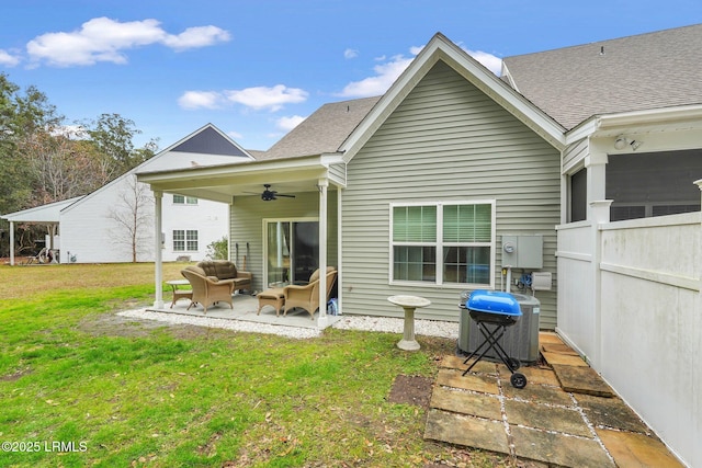 back of property with a patio, an outdoor hangout area, a yard, central AC unit, and ceiling fan