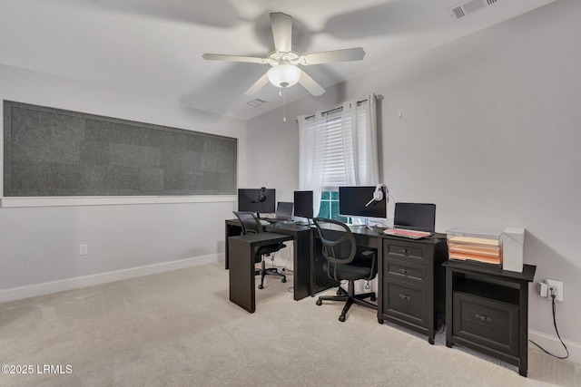 office area with light colored carpet and ceiling fan