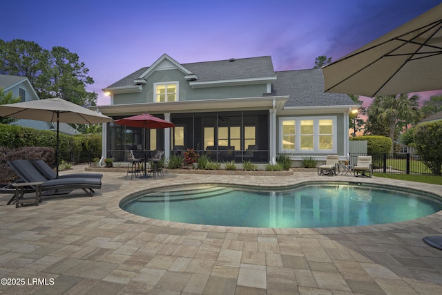 4 Halburton Cir, Bluffton, SC 29910 - pool at dusk with a patio and a sunroom