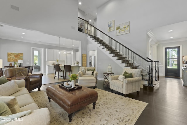 4 Halburton Cir, Bluffton, SC 29910 - living room with wood finished floors, ornamental molding, stairs, recessed lighting, and a towering ceiling