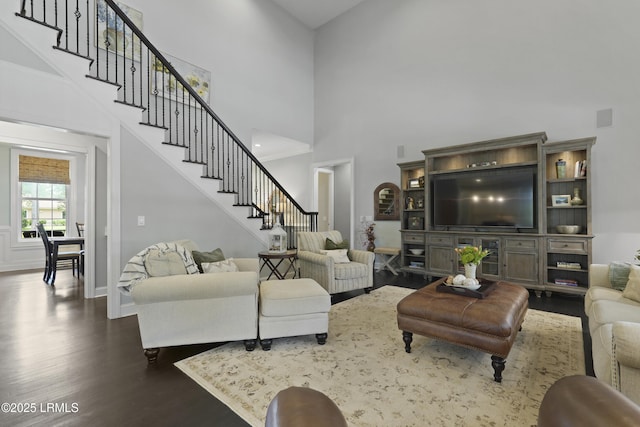 4 Halburton Cir, Bluffton, SC 29910 - living area featuring dark wood finished floors, stairs, a high ceiling, and baseboards