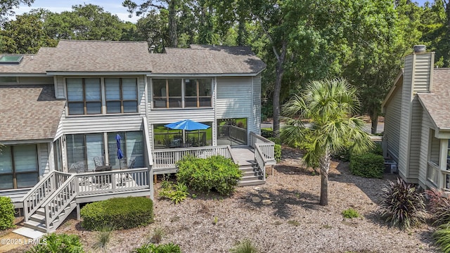 11 Lake Forest Dr Unit 3360, Hilton Head Island, SC 29928 - rear view of house with a wooden deck, a shingled roof, and view of wooded area