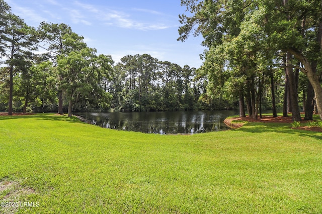 11 Lake Forest Dr Unit 3360, Hilton Head Island, SC 29928 - view of green lawn with a water view