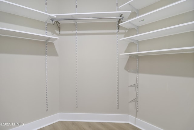 11 Lake Forest Dr Unit 3360, Hilton Head Island, SC 29928 - walk in closet featuring wood finished floors