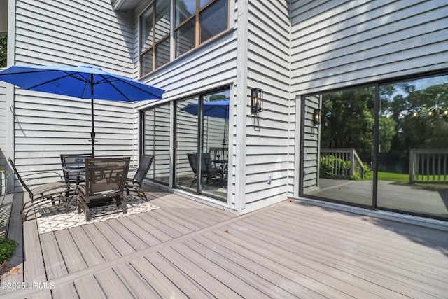 11 Lake Forest Dr Unit 3360, Hilton Head Island, SC 29928 - wooden terrace with outdoor dining area