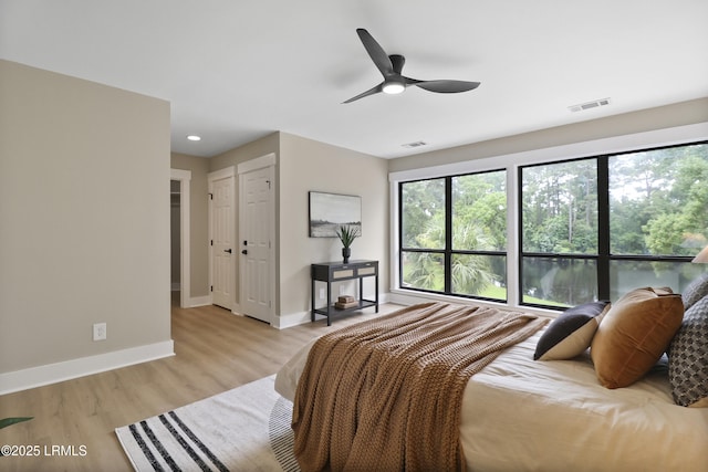 11 Lake Forest Dr Unit 3360, Hilton Head Island, SC 29928 - bedroom with light wood-style flooring, ceiling fan, and recessed lighting