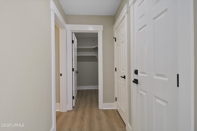 11 Lake Forest Dr Unit 3360, Hilton Head Island, SC 29928 - hallway featuring light wood-style flooring and baseboards