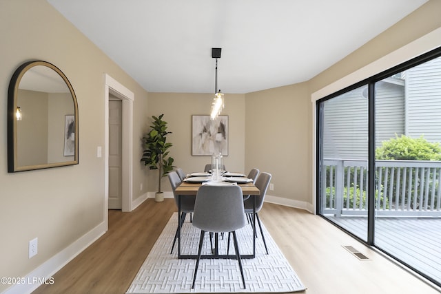 11 Lake Forest Dr Unit 3360, Hilton Head Island, SC 29928 - dining area with wood finished floors and baseboards