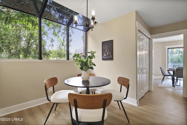 11 Lake Forest Dr Unit 3360, Hilton Head Island, SC 29928 - dining room with wood finished floors and a chandelier