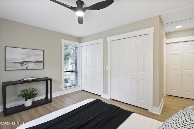 11 Lake Forest Dr Unit 3360, Hilton Head Island, SC 29928 - unfurnished bedroom featuring wood finished floors, two closets, ceiling fan, and recessed lighting