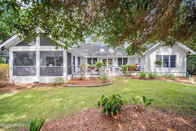1716 Longfield Dr, Saint Helena Island, SC 29920 - rear view of house featuring a sunroom and a yard