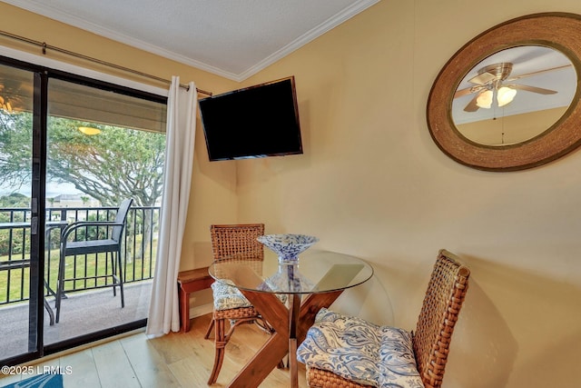 40 Folly Field Rd Unit C232, Hilton Head Island, SC 29928 - dining space featuring wood finished floors, ceiling fan, ornamental molding, and baseboards