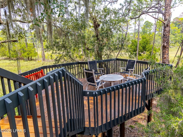 2065 Deer Island Rd, Hilton Head Island, SC 29928 - wooden terrace with view of scattered trees