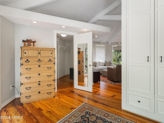 2065 Deer Island Rd, Hilton Head Island, SC 29928 - bedroom with light wood-type flooring, a spacious closet, and recessed lighting