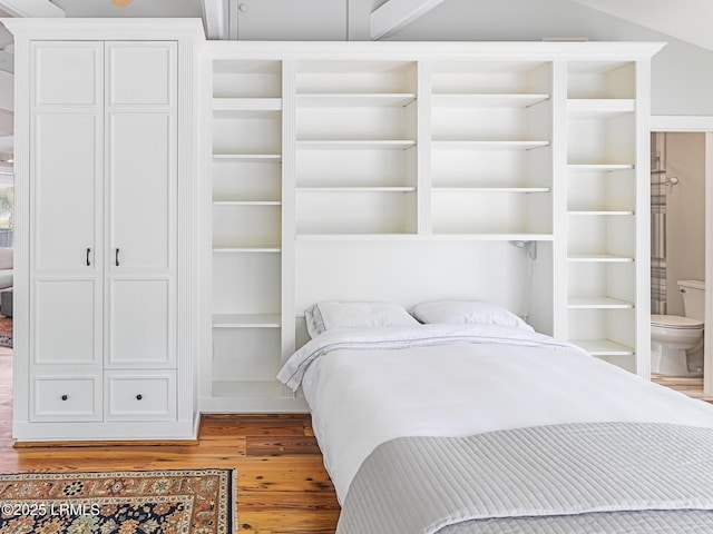 2065 Deer Island Rd, Hilton Head Island, SC 29928 - bedroom featuring wood finished floors and connected bathroom