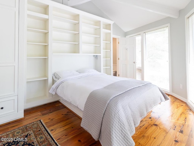 2065 Deer Island Rd, Hilton Head Island, SC 29928 - bedroom with wood finished floors and lofted ceiling
