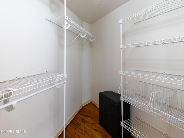 2065 Deer Island Rd, Hilton Head Island, SC 29928 - spacious closet featuring wood finished floors